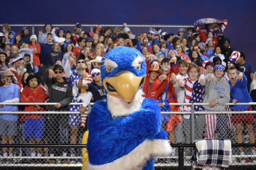 Seahawk Mascot proudly stands in front of the student section. 