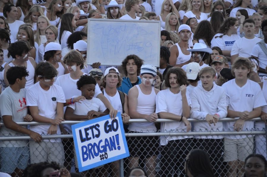 Students hold up “Let’s go Brogan” sign to support Brogan Eastlack 