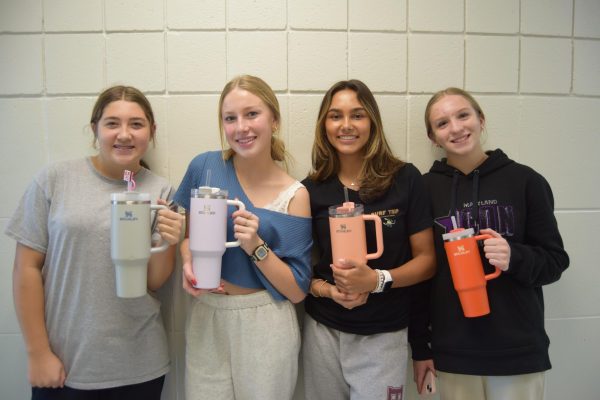 (L to R) Sophomores Isabella Dellies, Lexi Rupple, Nadeen Hassanein and Megan Brown are all proud owners of the popular stainless-steel 40-oz. FlowState Quencher mug. 