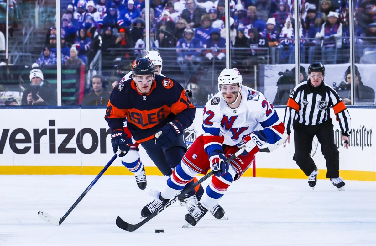Jonny Brodzinski (#22) skates with the puck during the first period against the New York Islanders during the 2024 NHL Stadium Series at MetLife Stadium on February 18.